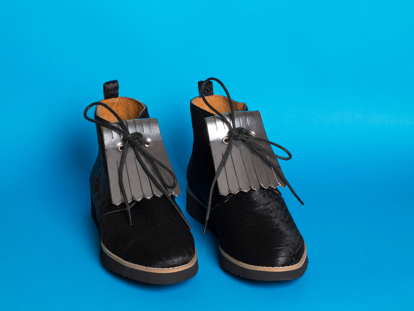 SILVER FUX: Mini length leather shoe fringe